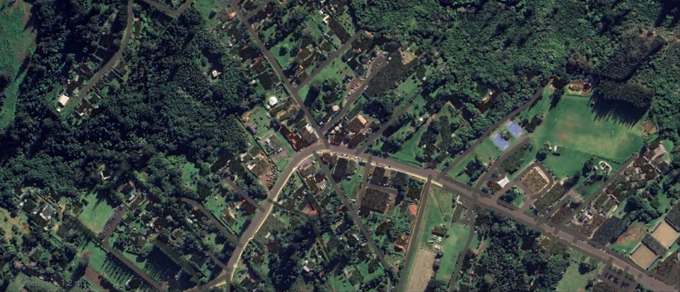 Satellite photo of Burnt Pine after Satmap — rooftops erased, roads painted at piece width